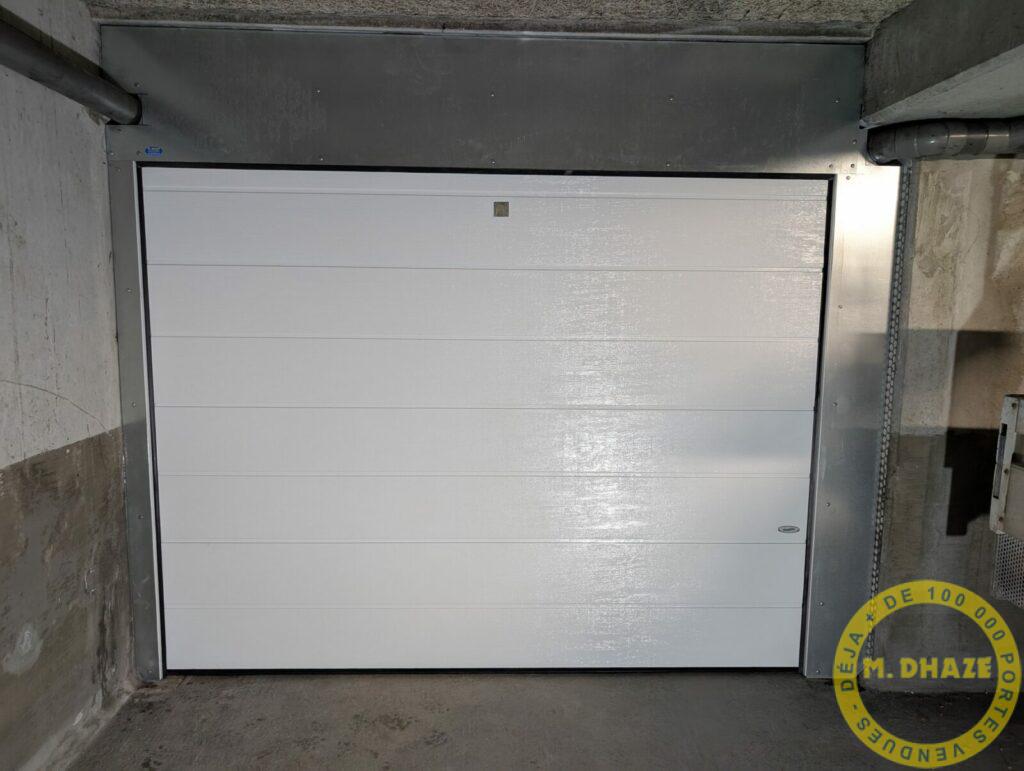 Porte sectionnelle Novoferm sous-sol   ossature métallique à Croix