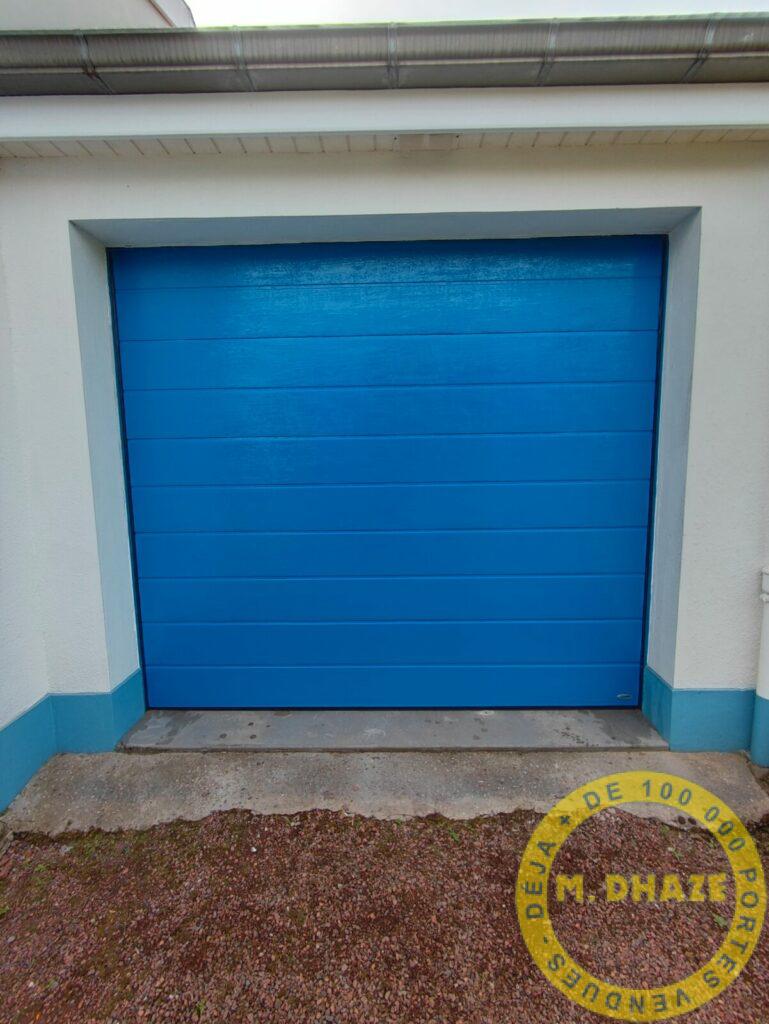 Porte sectionnelle Novoferm large lame WoodGrain à Bousbecque