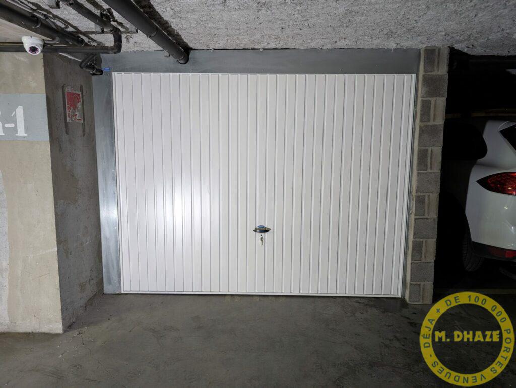 Installation de porte basculante sur box en parpainfs à Comines (Nord)