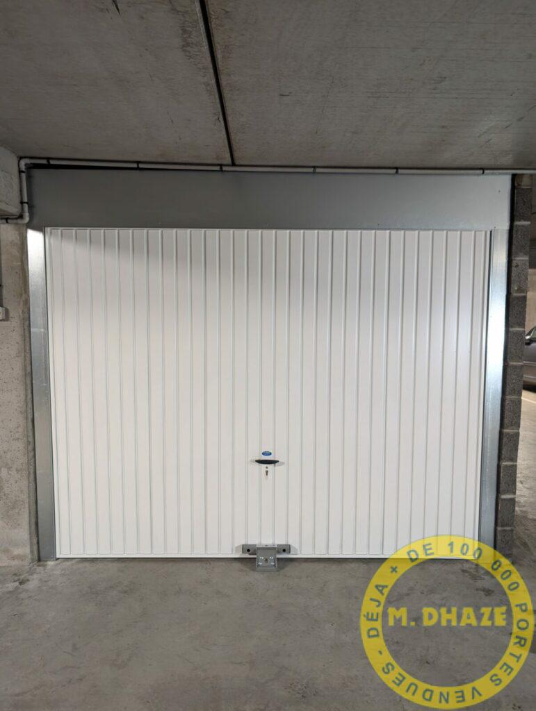 Installation d’une porte basculante de garage Novoferm à Villeneuve d’Ascq (59)