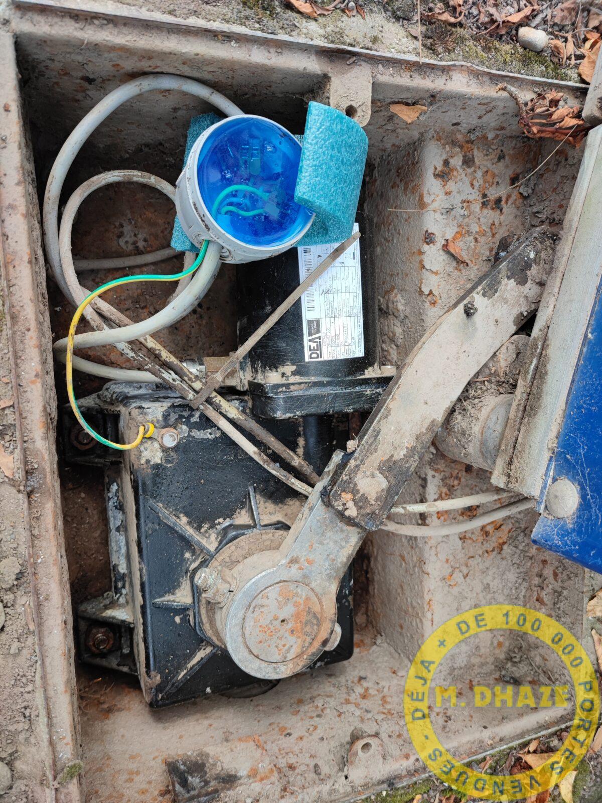 Dépannage sur un problème électrique d'un moteur de portail enterré à Quesnoy sur Deûle.