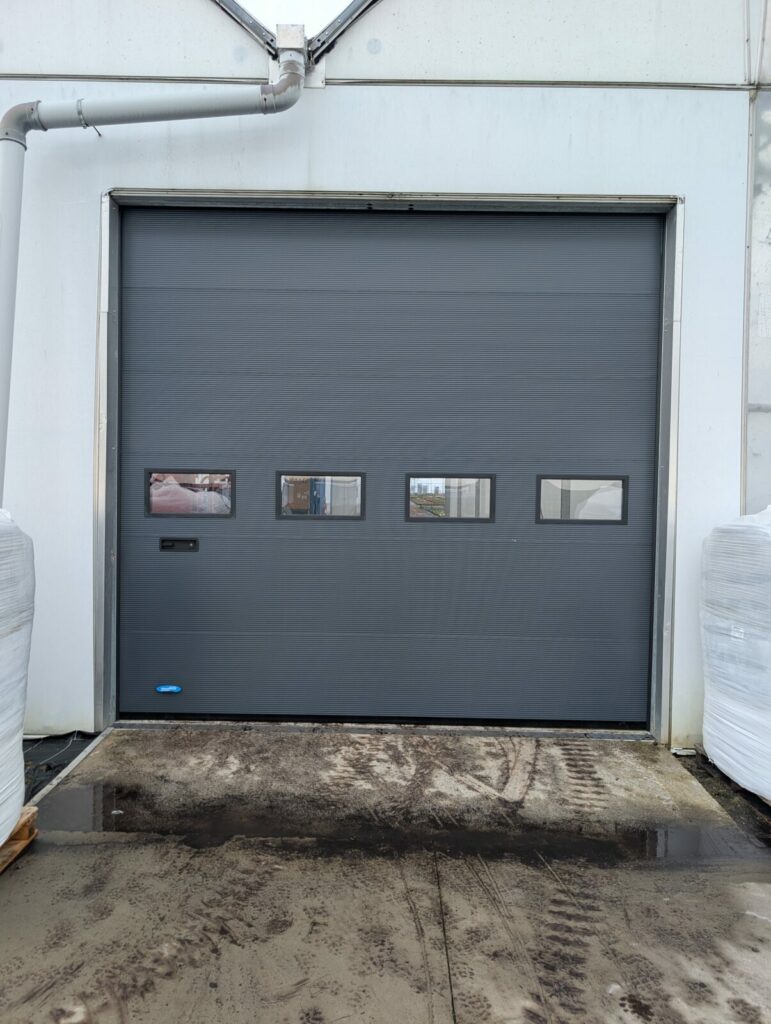 Remplacement de porte industrielle manuelle à Houplines (Nord)