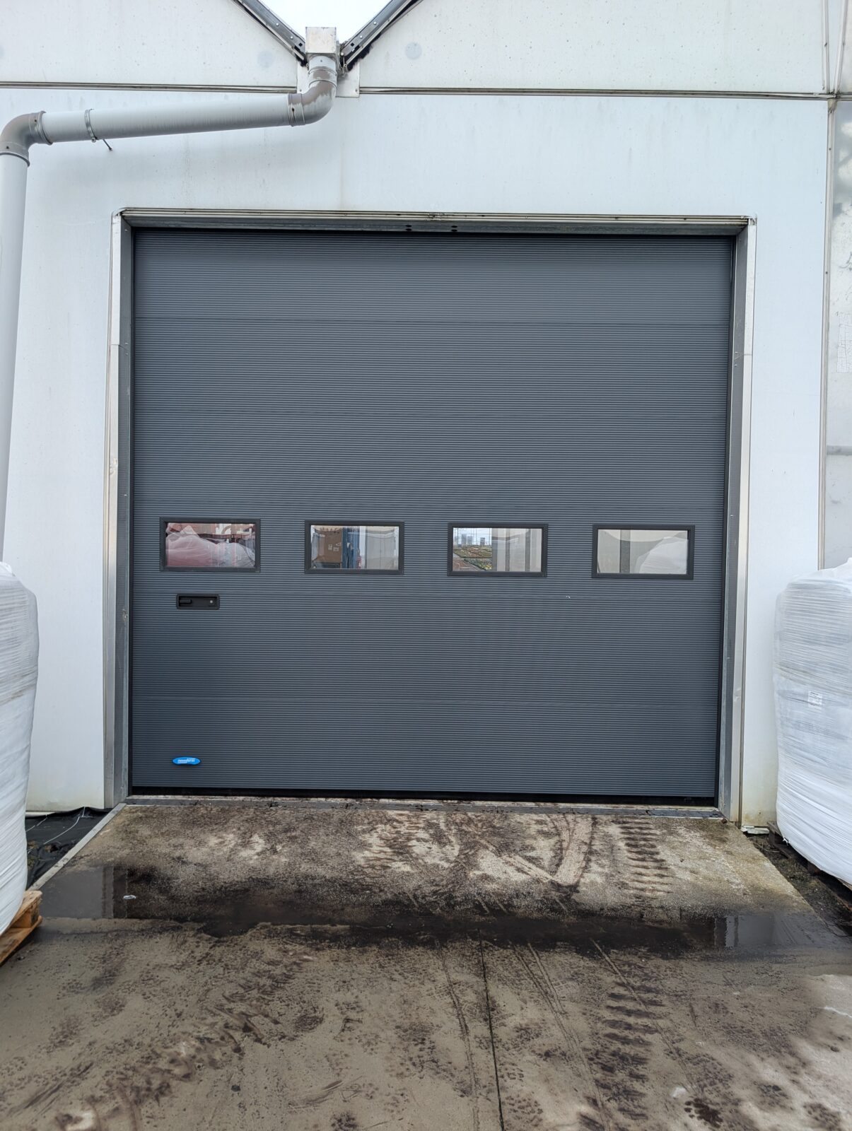 Remplacement de porte industrielle manuelle à Houplines (Nord) - Aprés